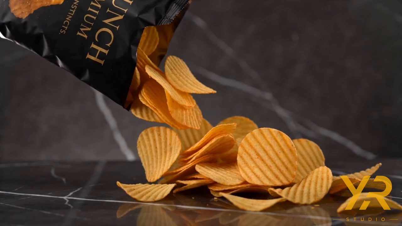 Chips spilled across black marble